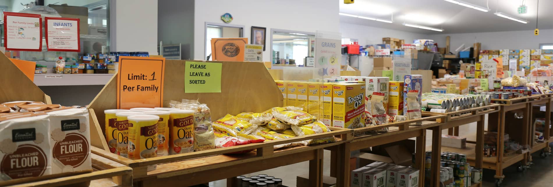 aisle of various food products at the FISH Food Pantry in Roseburg, OR